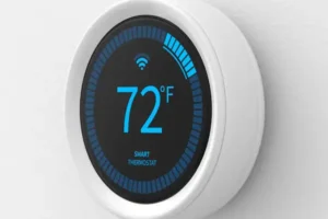 Round smart thermostat displaying 72 degrees Fahrenheit and a Wi-Fi icon.